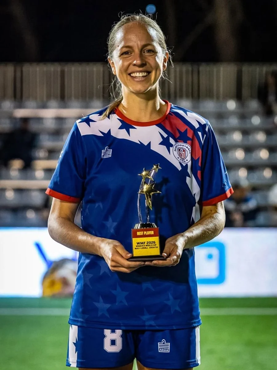Erin Yenney holds her Best Player award